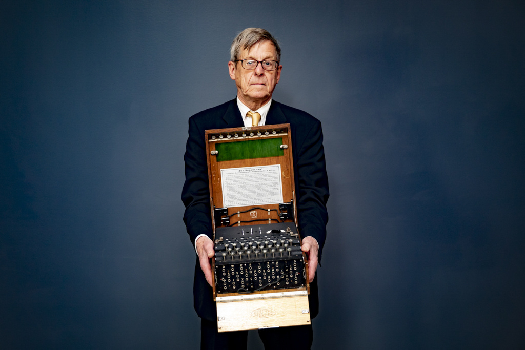 Mark Baldwin, known as Dr. Enigma, with his Enigma code machine